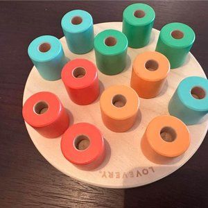 Lovevery stacking pegs